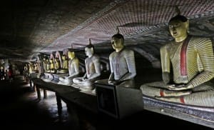 Row of Bhudda statues at Dambulla Cave Temple